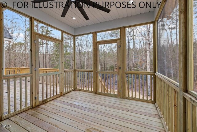 unfurnished sunroom featuring ceiling fan and a healthy amount of sunlight