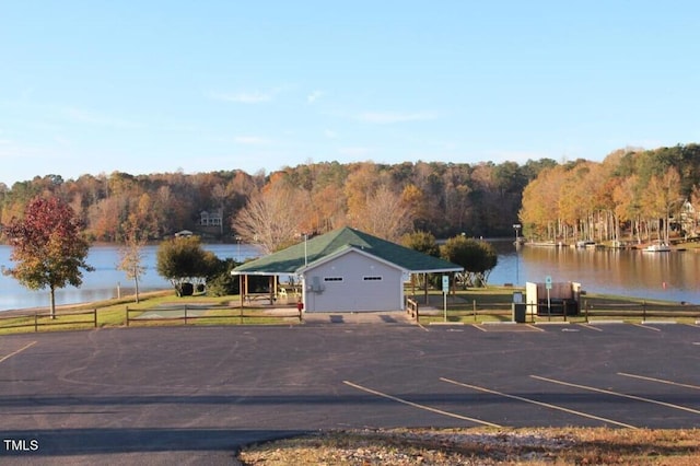 102 Mayan Dr, Louisburg, NC 27549 - view of water feature with a wooded view and fence