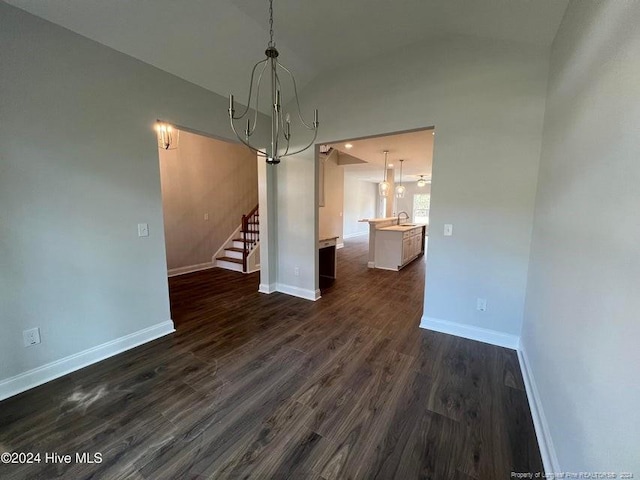 3 Vineyard Pl, Jackson Springs, NC 27281 - unfurnished dining area featuring a chandelier, vaulted ceiling, stairs, and dark wood-style floors