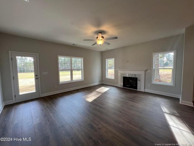 3 Vineyard Pl, Jackson Springs, NC 27281 - unfurnished living room featuring ceiling fan, dark wood-type flooring, and a high end fireplace