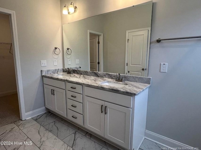 3 Vineyard Pl, Jackson Springs, NC 27281 - bathroom with marble look tiles, double vanity, and a spacious closet