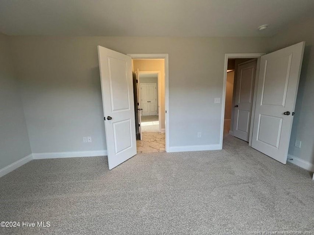 3 Vineyard Pl, Jackson Springs, NC 27281 - unfurnished bedroom with light carpet and baseboards