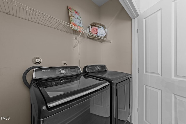laundry area with washer and dryer and laundry area