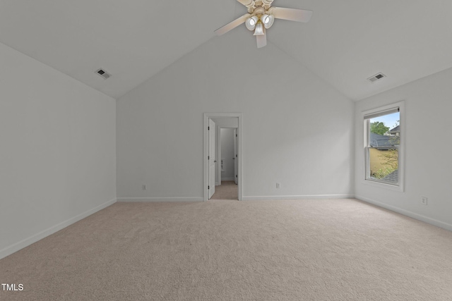 interior space featuring visible vents, baseboards, and light colored carpet