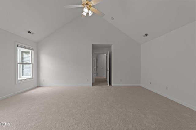 unfurnished bedroom with visible vents, light colored carpet, and baseboards