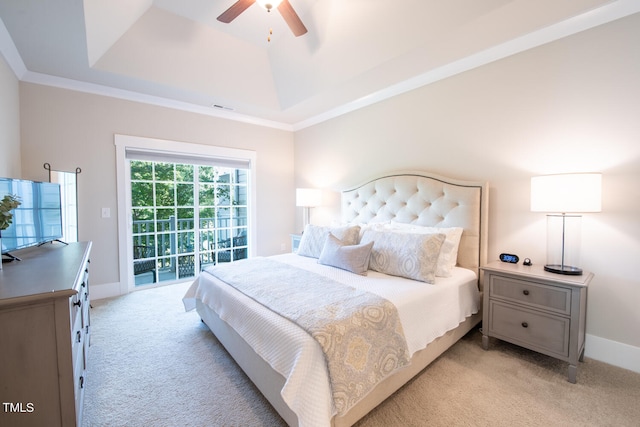 bedroom with a tray ceiling, ceiling fan, light colored carpet, and access to exterior