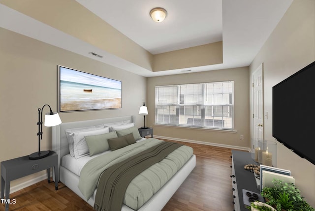 bedroom with wood-type flooring