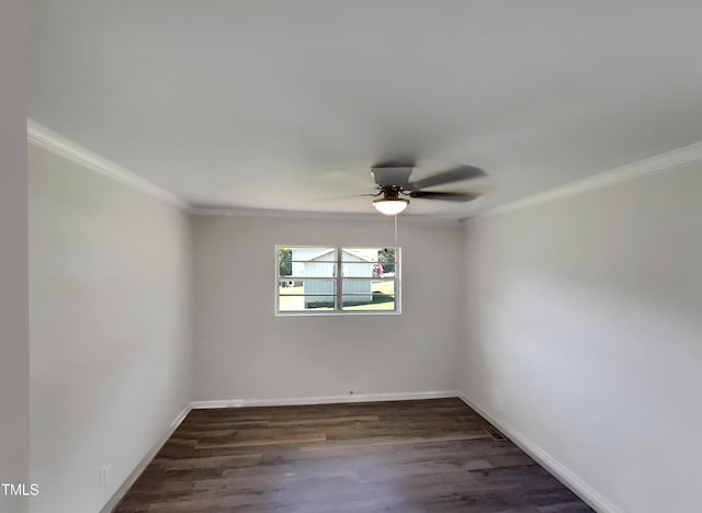 unfurnished room with baseboards, ceiling fan, dark wood-style flooring, and crown molding