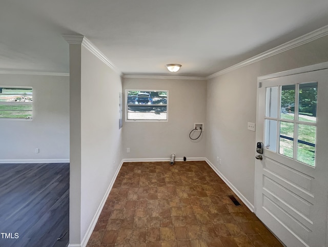 interior space featuring hookup for a washing machine and ornamental molding