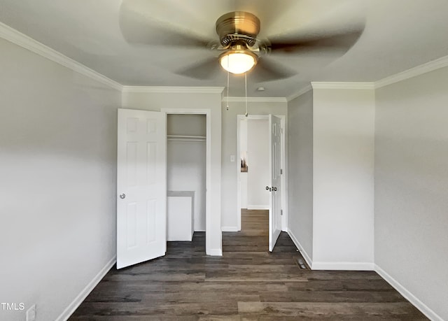 unfurnished bedroom featuring a closet, ceiling fan, dark hardwood / wood-style floors, and crown molding