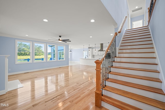 2804 Jack Mitchell Rd, Zebulon, NC 27597 - stairs featuring visible vents, wood finished floors, recessed lighting, and a ceiling fan