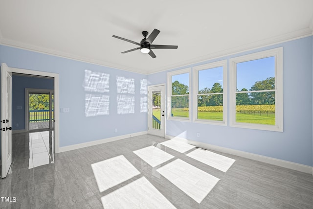 2804 Jack Mitchell Rd, Zebulon, NC 27597 - empty room featuring baseboards, ceiling fan, and crown molding
