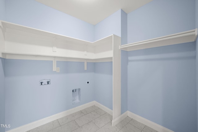 2804 Jack Mitchell Rd, Zebulon, NC 27597 - laundry area with hookup for a washing machine, baseboards, marble finish floor, laundry area, and electric dryer hookup