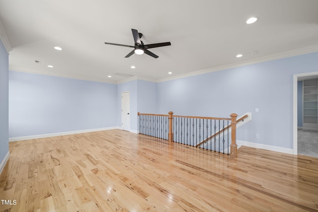 2804 Jack Mitchell Rd, Zebulon, NC 27597 - unfurnished room featuring recessed lighting, crown molding, baseboards, and wood finished floors