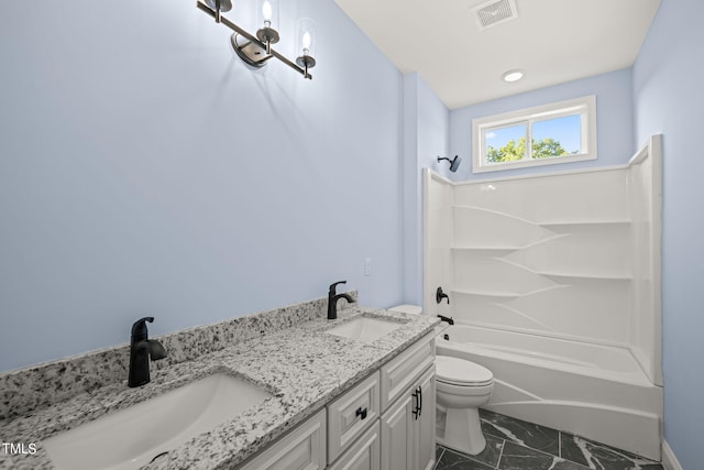 full bathroom featuring vanity, toilet, and bathtub / shower combination