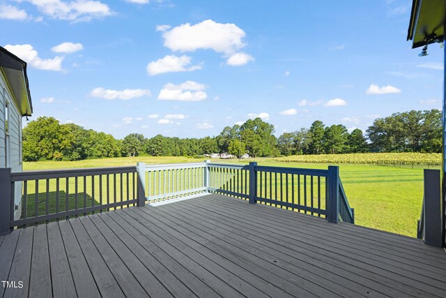 deck featuring a yard