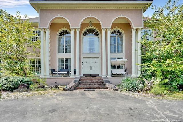 property entrance with a porch