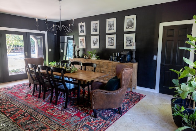 dining room with french doors, light tile patterned floors, and a chandelier