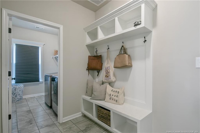 mudroom featuring washer and dryer