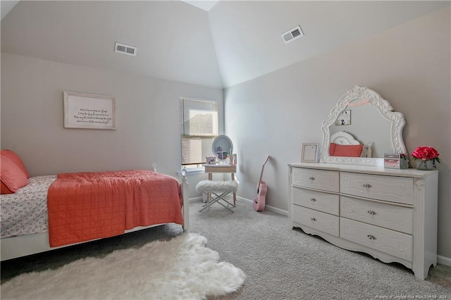 carpeted bedroom featuring lofted ceiling