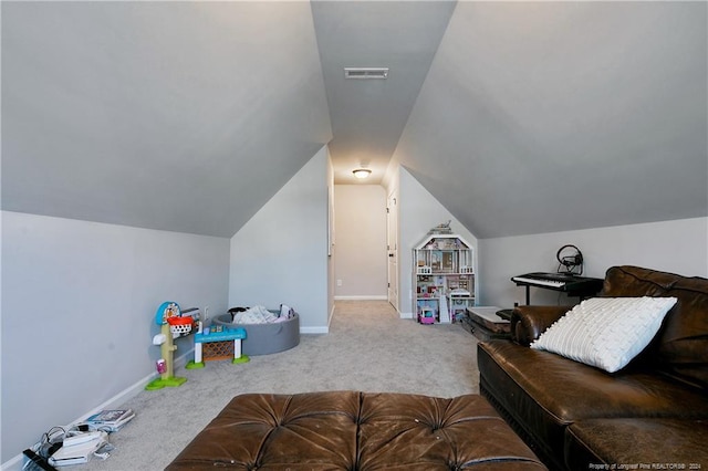 playroom featuring vaulted ceiling and carpet floors