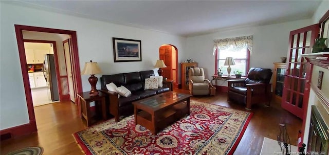 living room with dark hardwood / wood-style floors