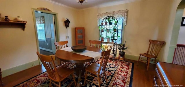 sitting room featuring hardwood / wood-style floors and ornamental molding