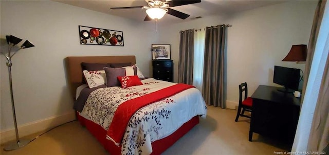 bedroom featuring ceiling fan and light colored carpet