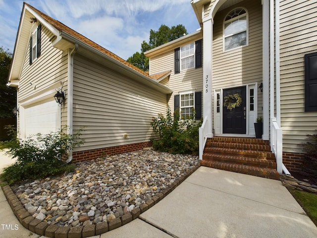 property entrance with a garage