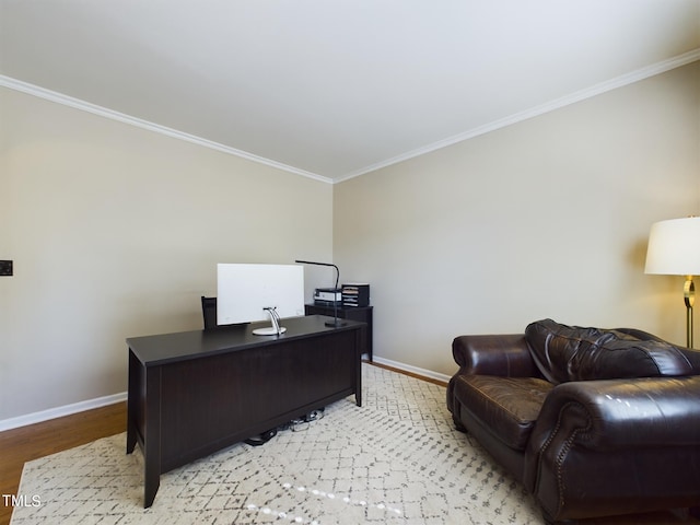 office space featuring ornamental molding and light hardwood / wood-style floors