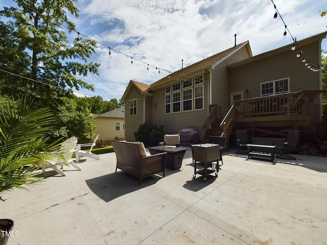 view of patio / terrace featuring a wooden deck and an outdoor hangout area