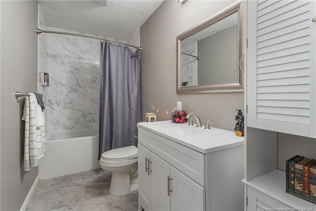 full bathroom with shower / tub combo with curtain, vanity, toilet, and a textured ceiling