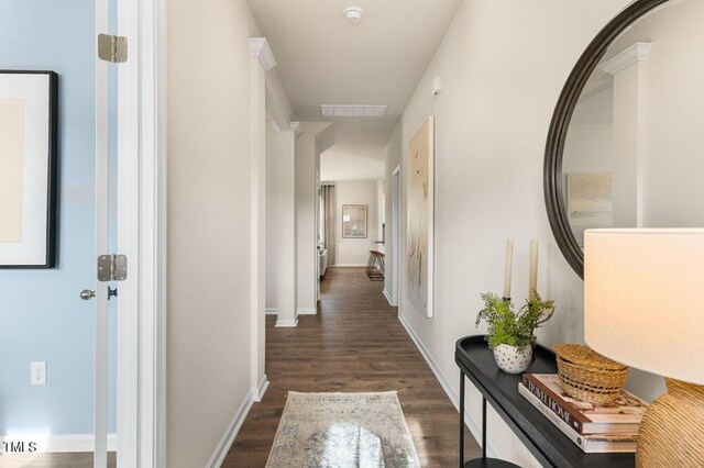 hall with dark hardwood / wood-style flooring