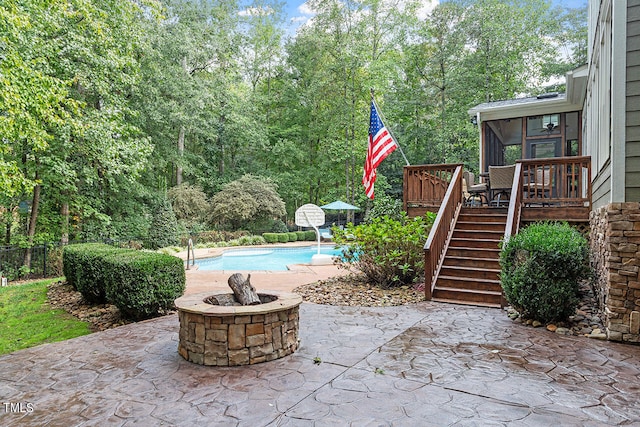 view of patio / terrace with a swimming pool side deck