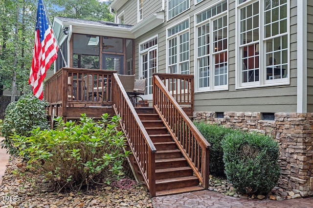 doorway to property with a wooden deck