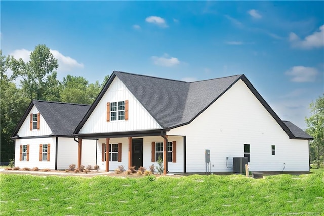 view of front facade with a front lawn and a porch