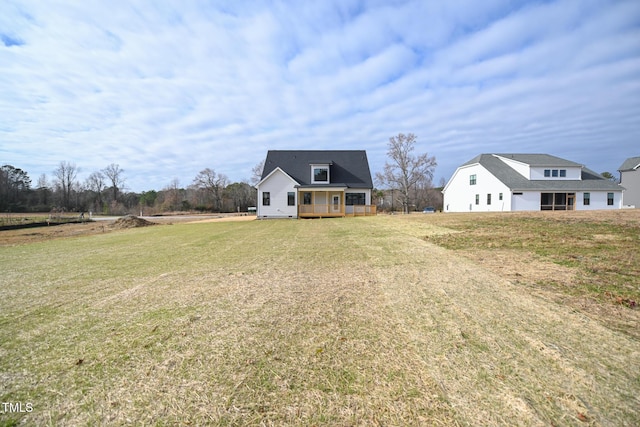 view of front of house featuring a front lawn and a porch