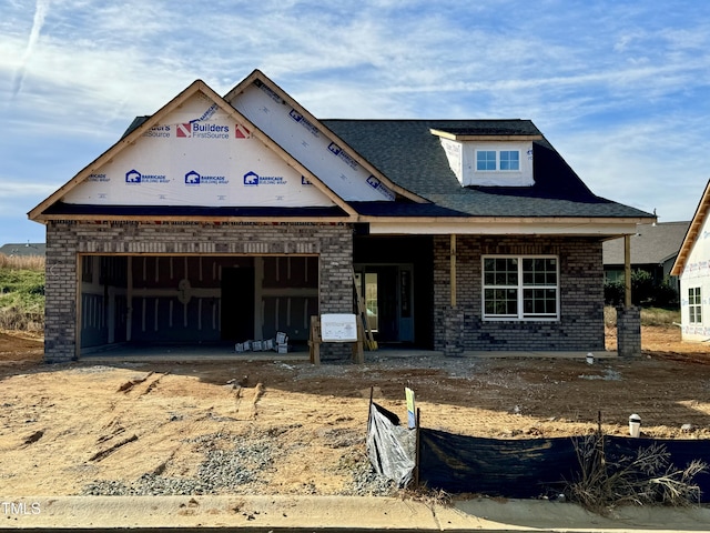 unfinished property with a garage