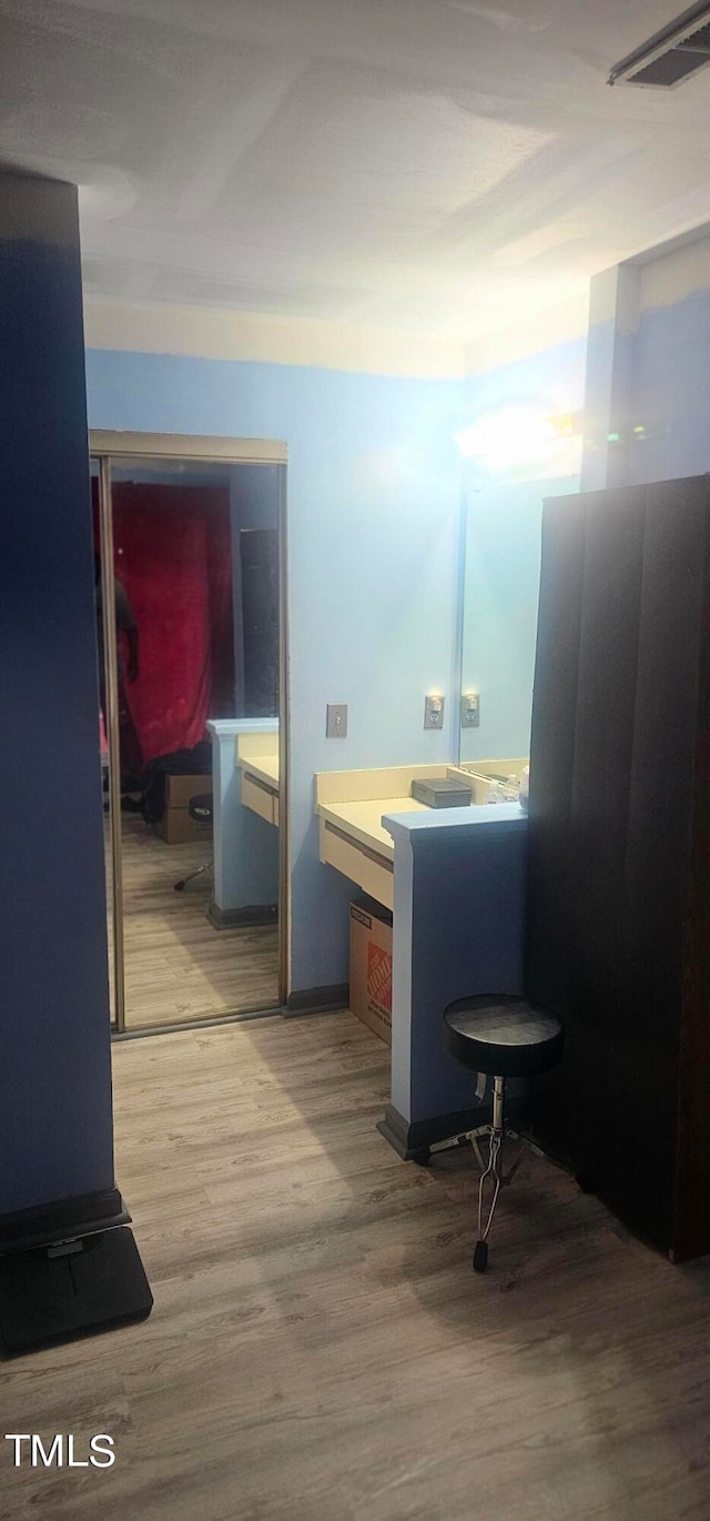 bathroom featuring hardwood / wood-style floors