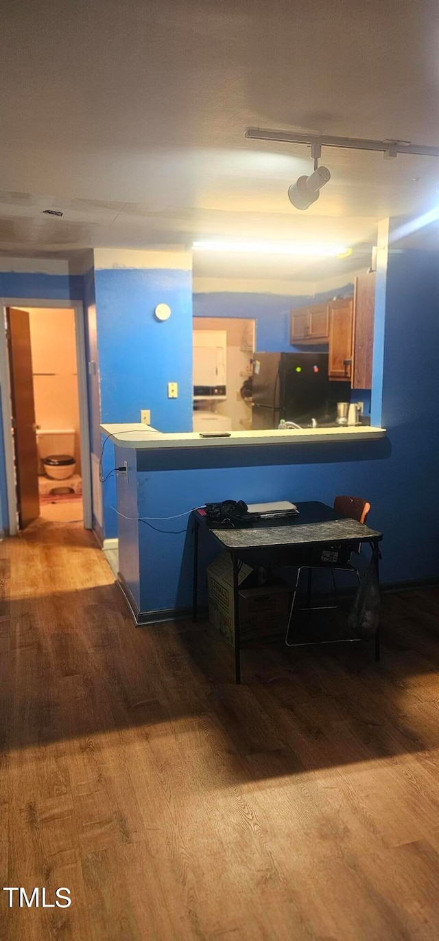 kitchen with black refrigerator