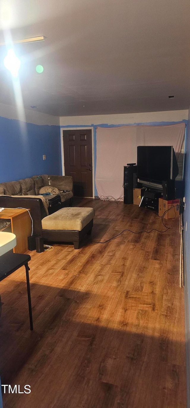 living room with wood-type flooring