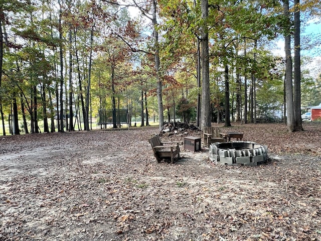 exterior space with an outdoor fire pit