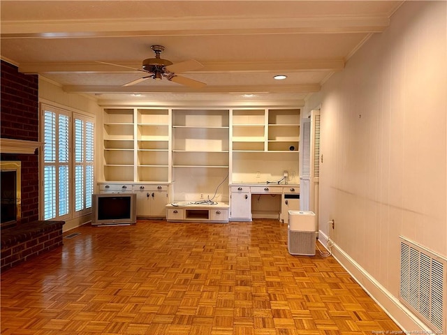 unfurnished living room with a fireplace, light parquet flooring, beamed ceiling, and ceiling fan