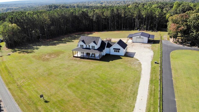 drone / aerial view with a forest view