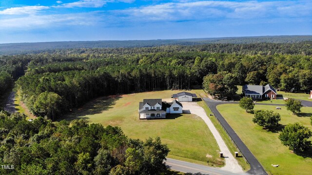 aerial view with a wooded view