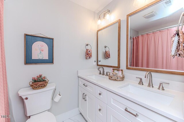 full bath featuring visible vents, a sink, toilet, and marble finish floor