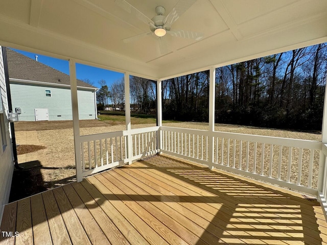 wooden deck with ceiling fan