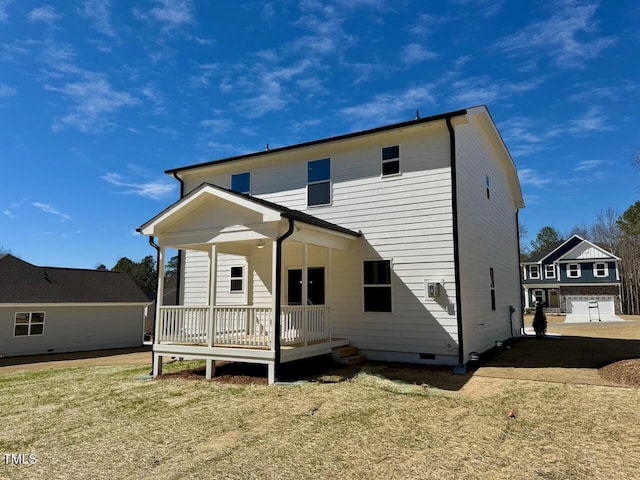 rear view of house featuring crawl space