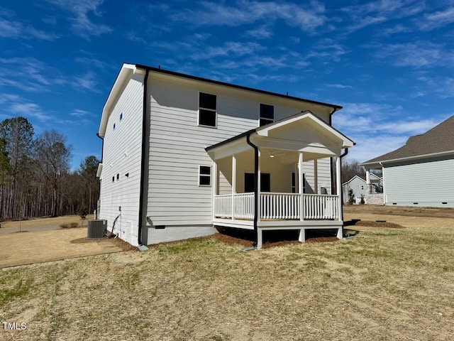 back of house with central AC and crawl space