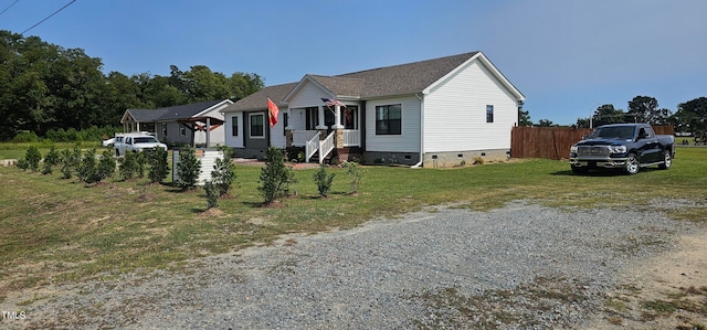 view of front facade featuring a front yard